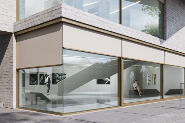 Zatahovací řešení protisluneční ochrany pro skleněné rohy